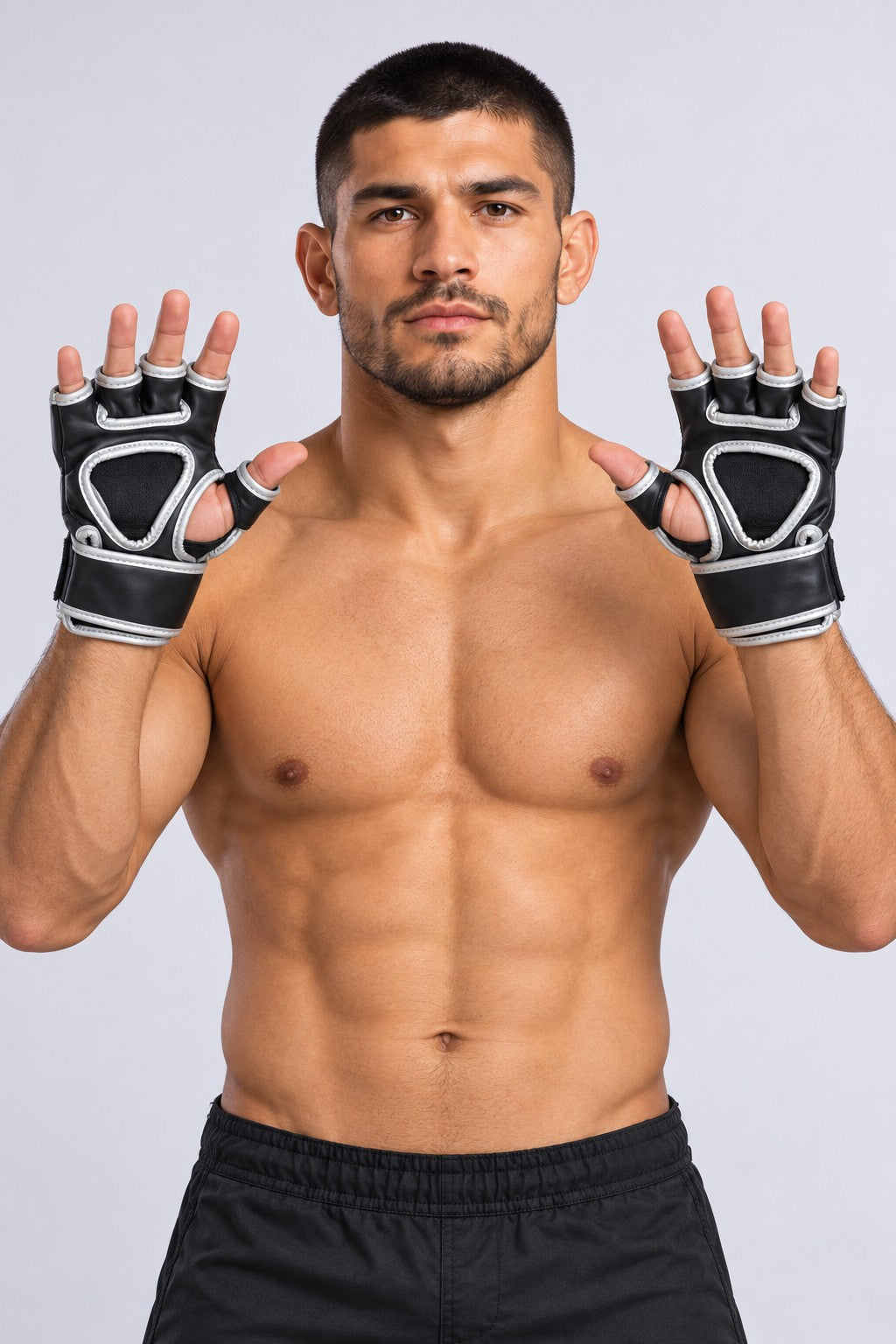 Palms of TITLE Powerhide MMA grappling gloves: black mesh palm panel, silver piping and individual finger loops