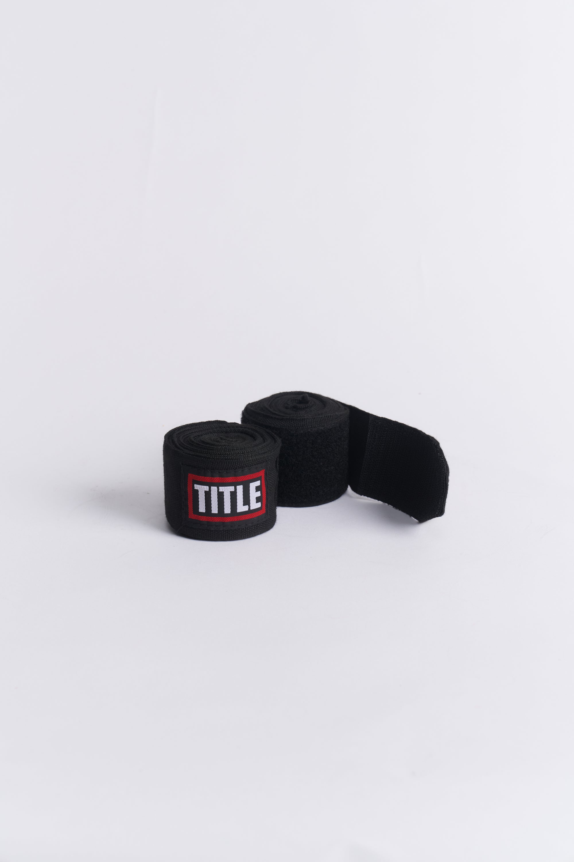 TITLE Boxing South Africa black woven cotton hand wraps with red logo patch and hook-and-loop closure