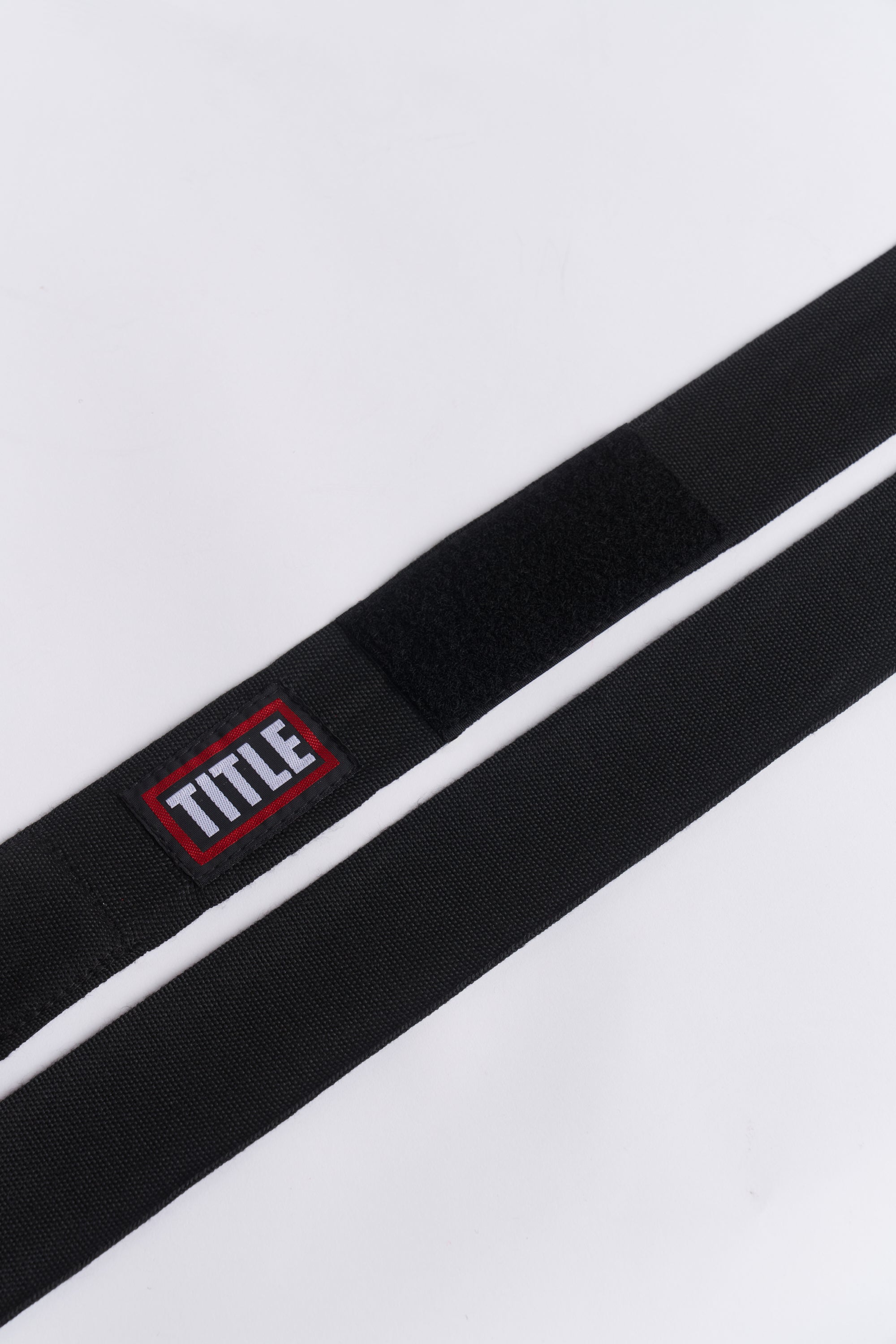 TITLE Boxing South Africa black woven cotton hand wraps with hook-and-loop closure and branded logo patch