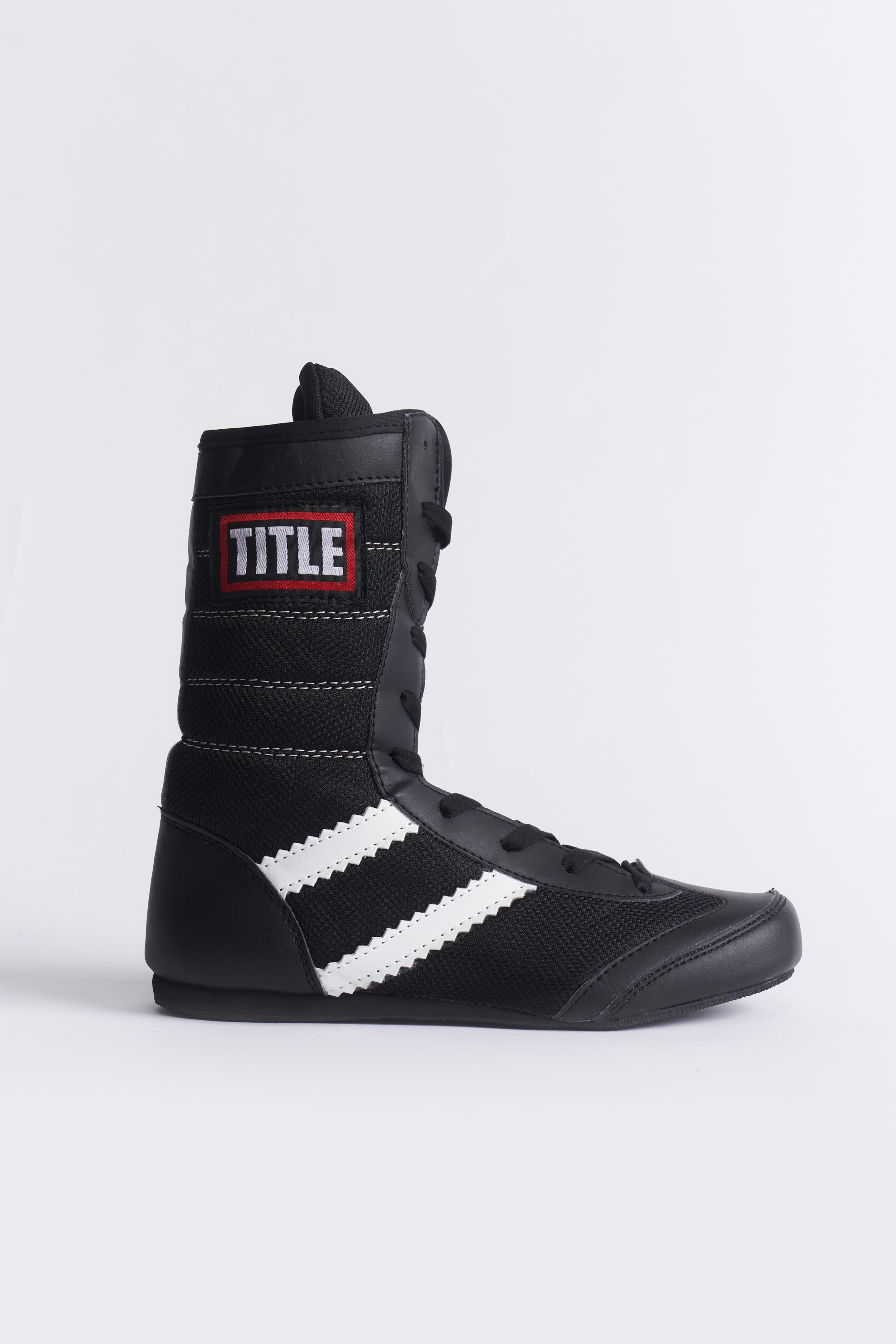 TITLE Boxing South Africa black high-top boxing boots with white side stripes and ankle support for ring performance