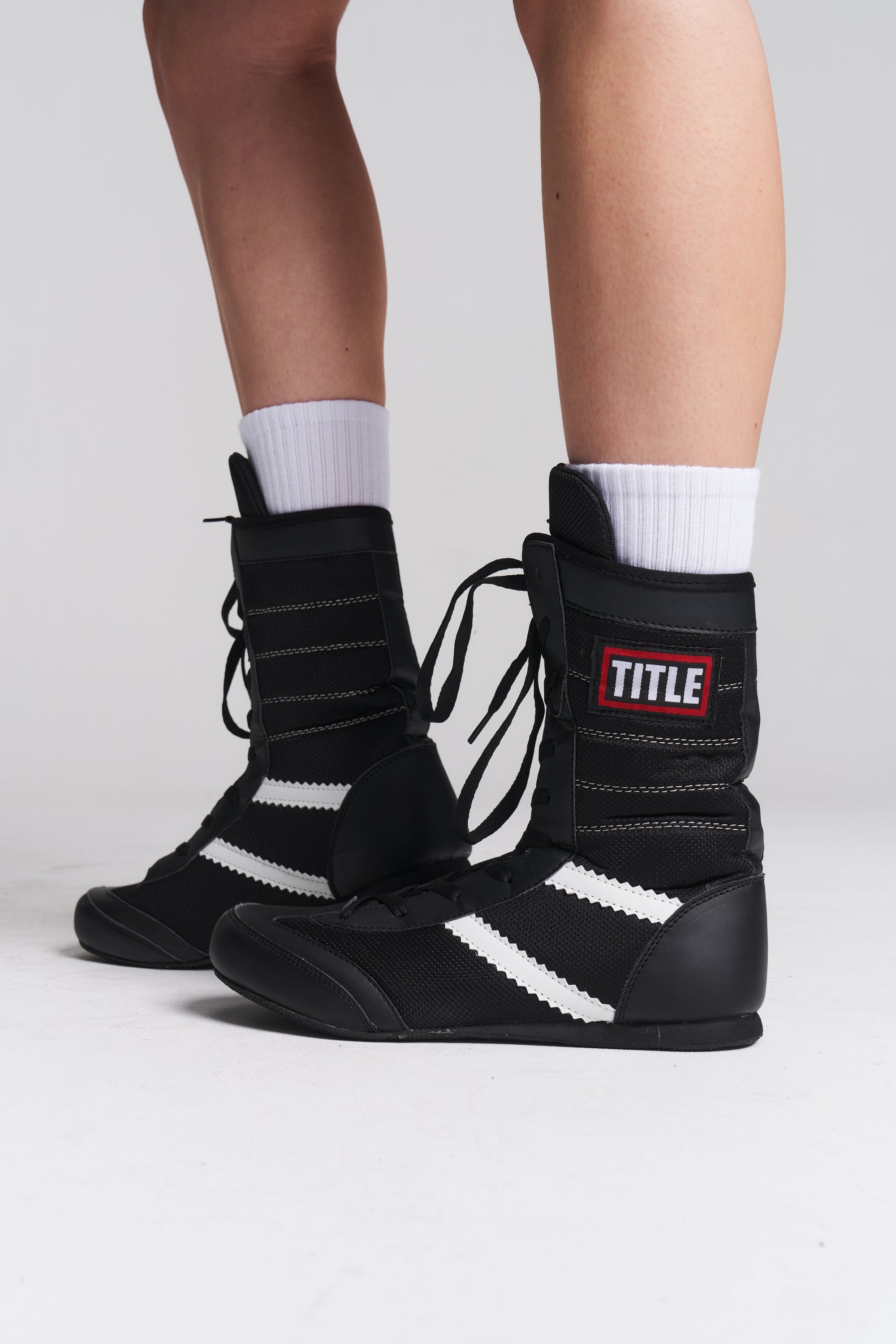 TITLE Boxing South Africa black high-top boxing boots with PU leather and nylon construction and ankle support