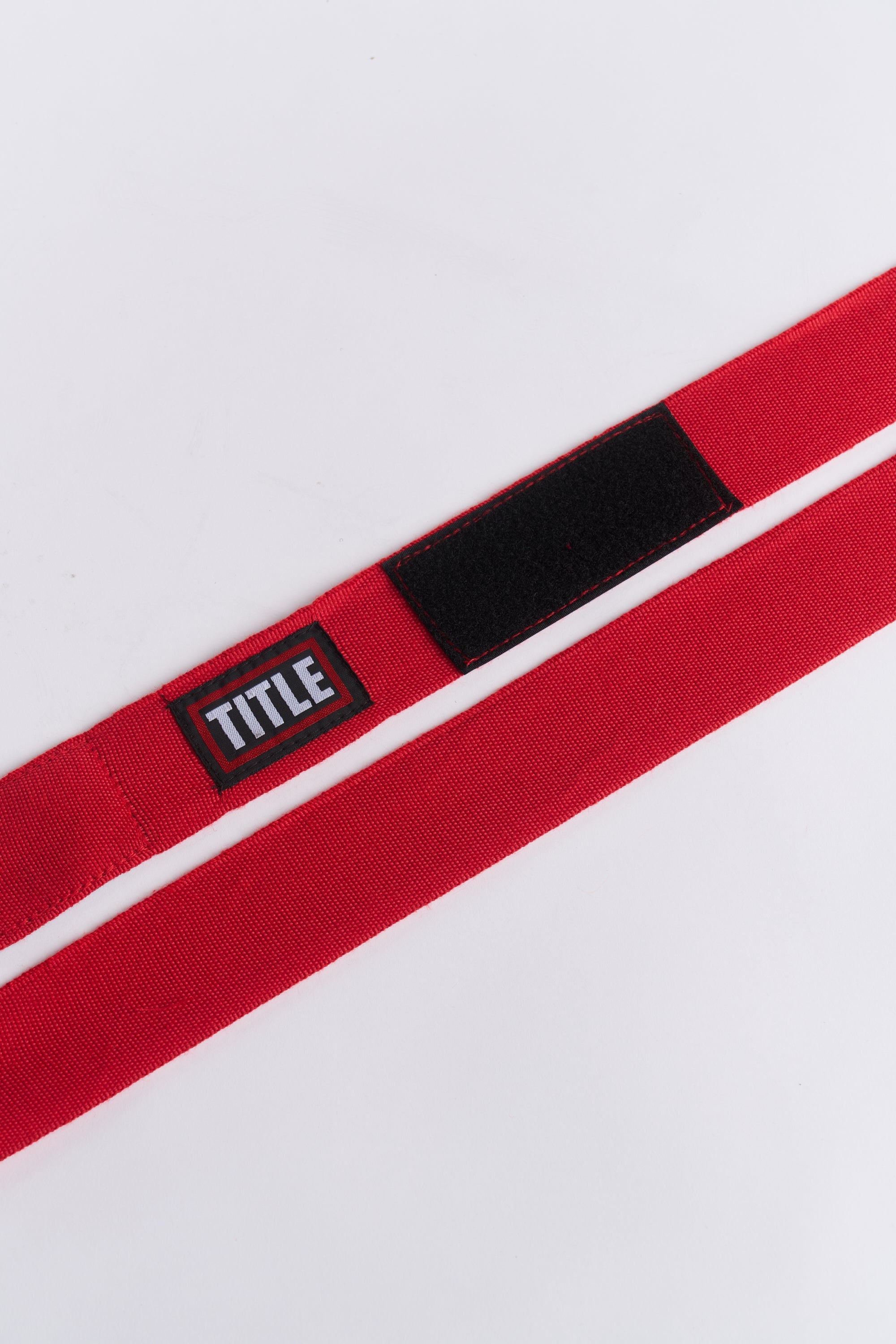 TITLE Boxing South Africa red woven cotton boxing hand wraps with hook-and-loop closure and brand logo patch