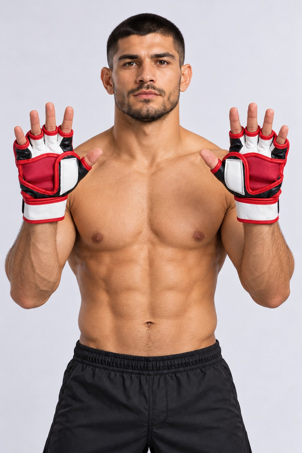 Open palms of TITLE leather MMA grappling gloves: red palm panel, white thumb patch and red-trimmed finger loops